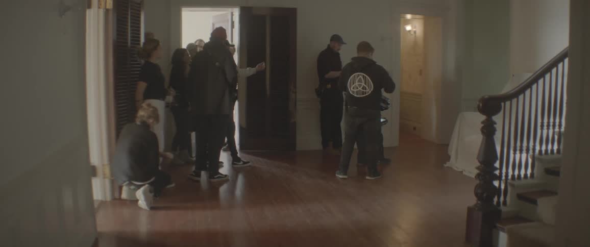 A film crew works on a film site