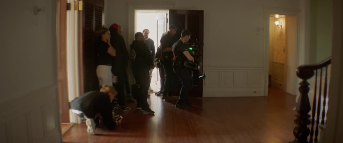 A film crew are working in the home