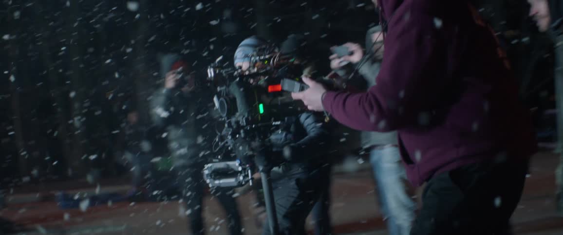 A film crew is recording a scene
