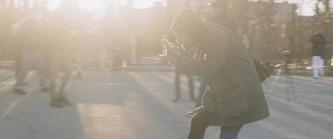 A man directs on a film site