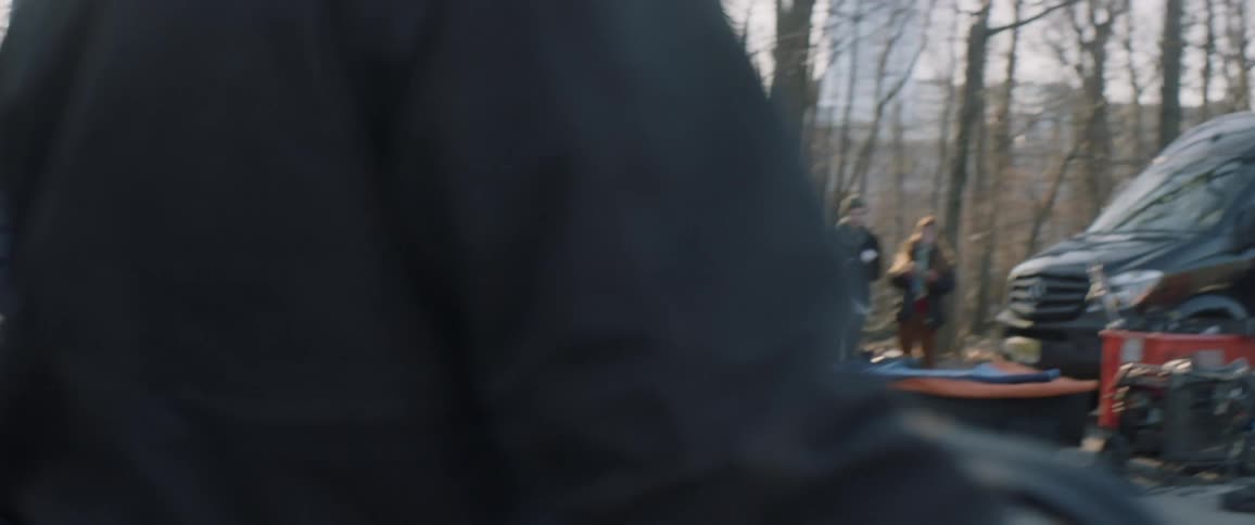 A man is being filmed as he fires a gun