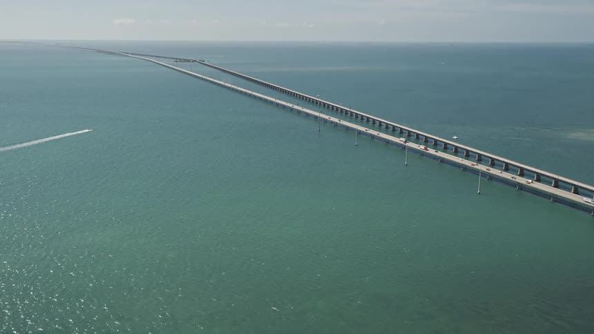 Approaching the Seven Mile Bridge past Knights Key in Marathon Florida flying over the Atlantic Ocean with light traffic