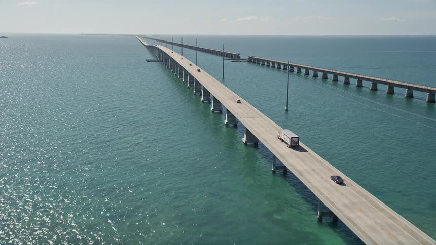 Aerial footage reveals light traffic on Seven Mile Bridge over the Atlantic Ocean in Florida