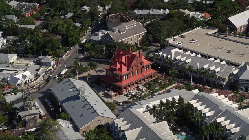 Fly over the Key West Museum of Art and History at the Custom House captured in stunning aerial view during summertime in Florida