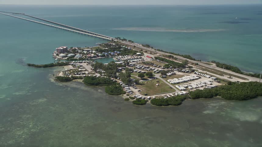 Approaching Knights Key RV park and Marathons shoreline seen from an aerial during a sunny day in South Florida