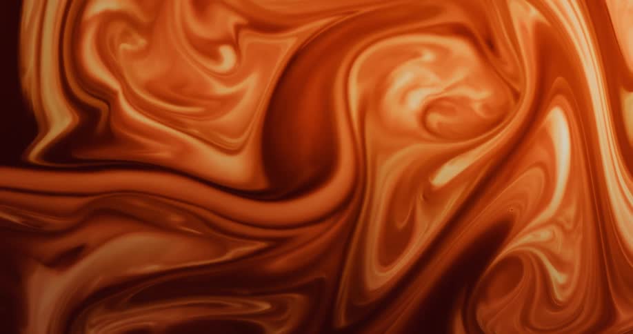 A colorful flow of liquid swirls and mixes to create a beautiful scene