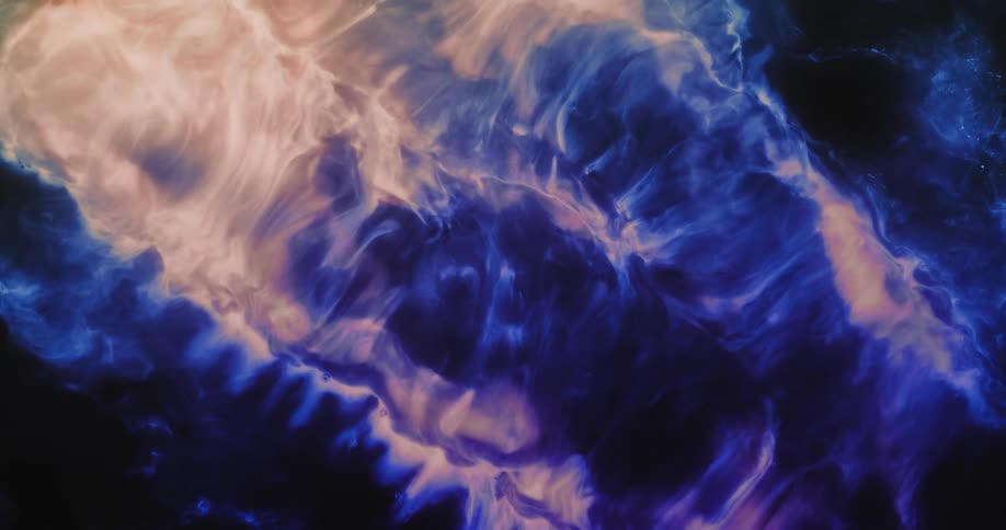 A blue liquid moving in wavelike patterns