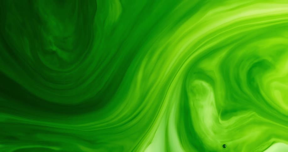 Green and yellow paint swirl together