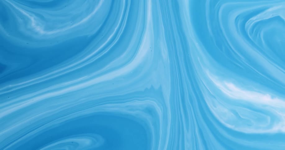 Abstract image of blue and white paint swirling around