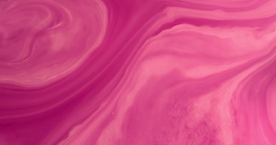 A swirling liquid with multiple shades of pink