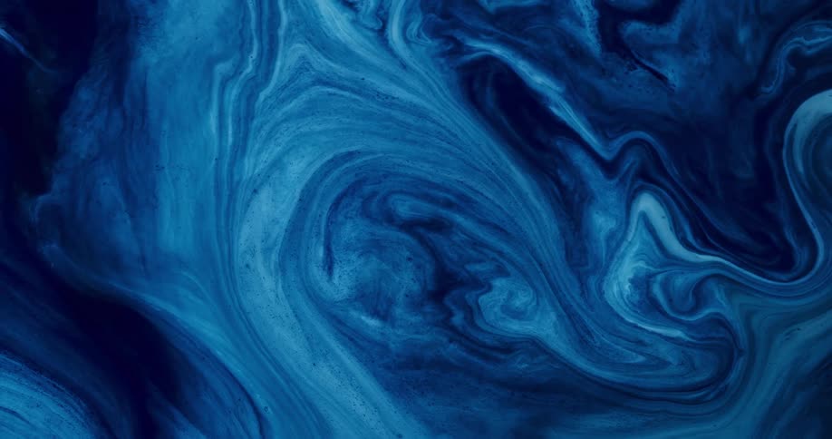 Blue liquids are being mixed together