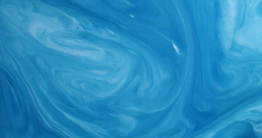 Blue and white paint swirl together to form a swirled pattern