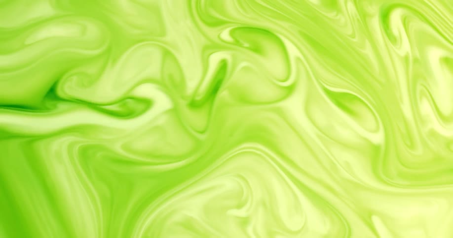 White paint is added to green paint to create a swirled pattern
