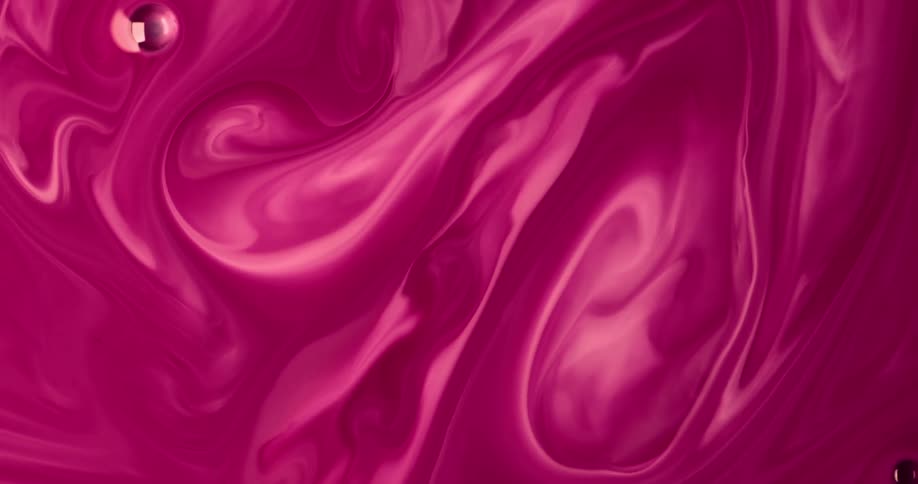 A view of colorful water with swirls