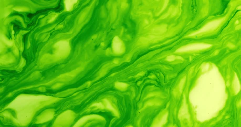 Close up of green liquid flowing