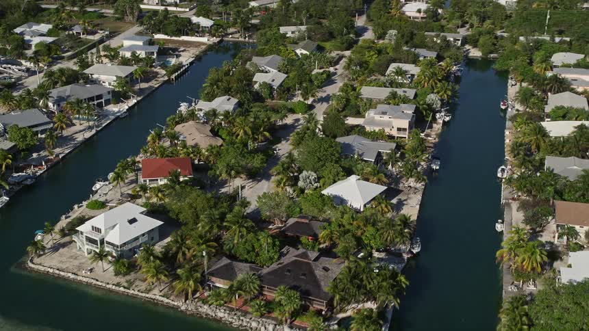 Approaching residential area on Lower Sugarloaf Key Florida with manmade canals seen from an aerial view