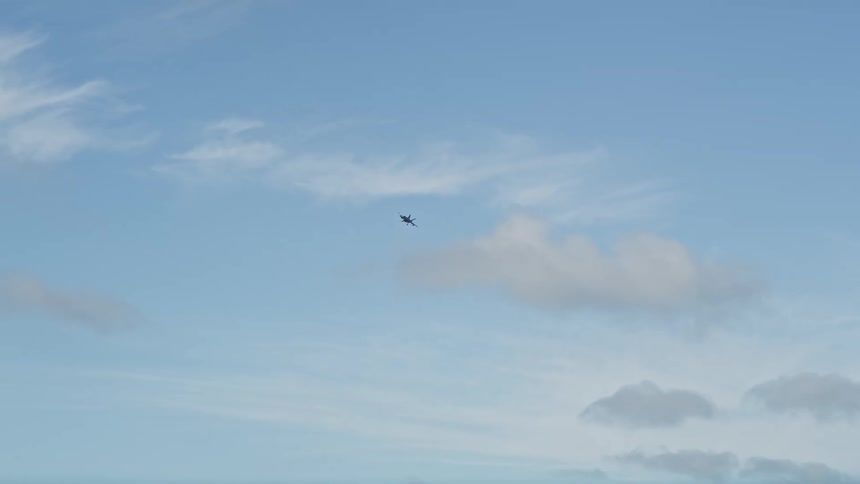 A military F-18 is tracked in flight over the sunny skies of Key West Florida