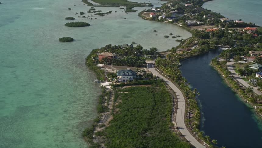 A stunning aerial shot of Shark Key Floridas coastal neighborhood showcasing picturesque homes and beautiful shoreline