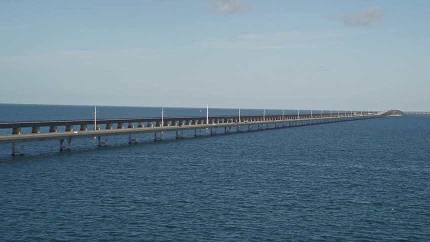 Aerial view of light automobile traffic on the exceptionally long Seven Mile Bridge connecting Florida Keys