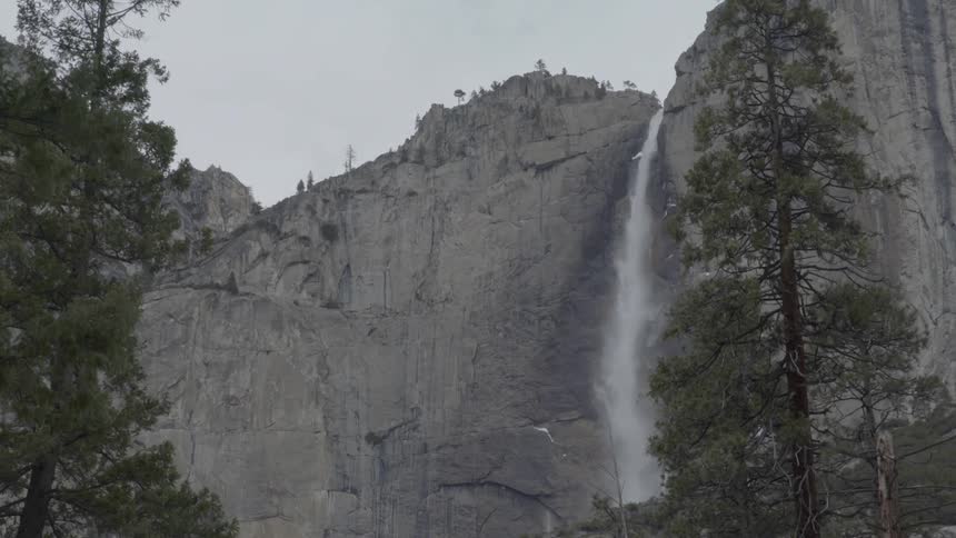 Water streams down a rocky cliff