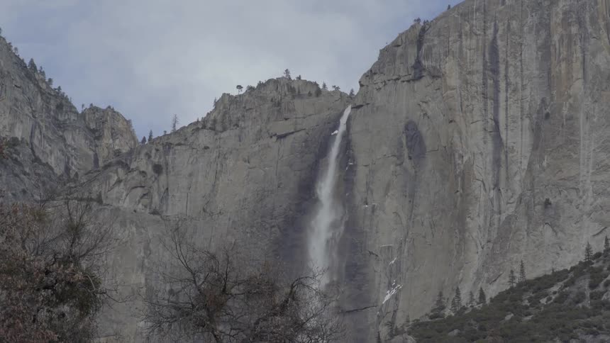 Water flowing of the edge of a big cliff