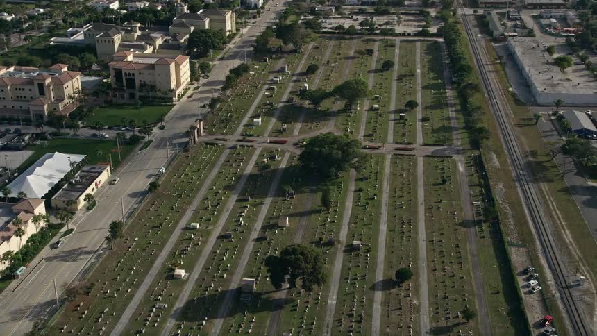 Approaching the Woodlawn Cemetery in West Palm Beach Florida during a partly cloudy day