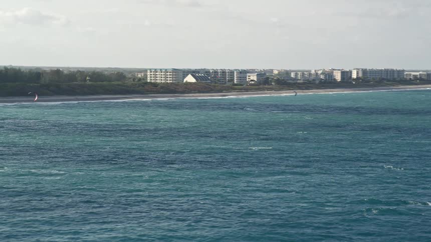 Aerial view of kite surfers enjoying the waves near Juno Beach Florida