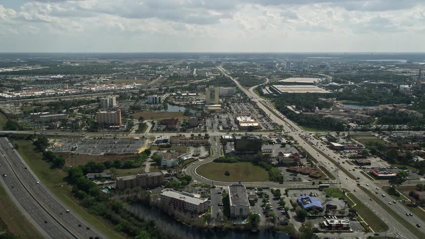 This aerial stock footage showcases Orlandos hotels near Universal Studios during daytime