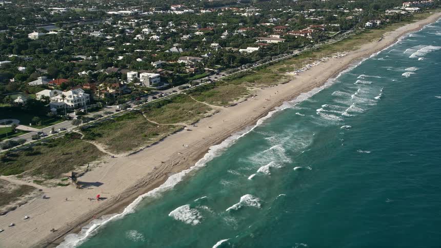 Aerial view of sunbathers enjoying the beach in Delray Beach Florida