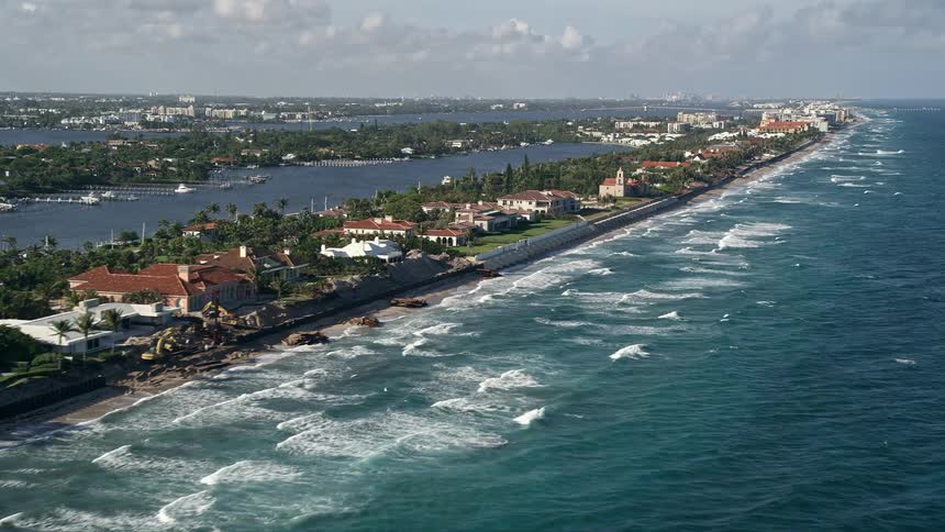 This 5K aerial footage showcases the luxurious coastal mansions located in Manalapan Florida