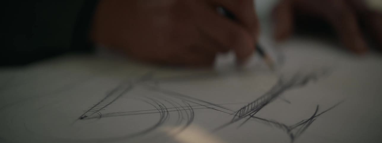 Close up of hand drawing with a pencil