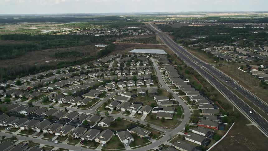 Aerial view of residential neighborhoods and wetlands in Clermont Florida
