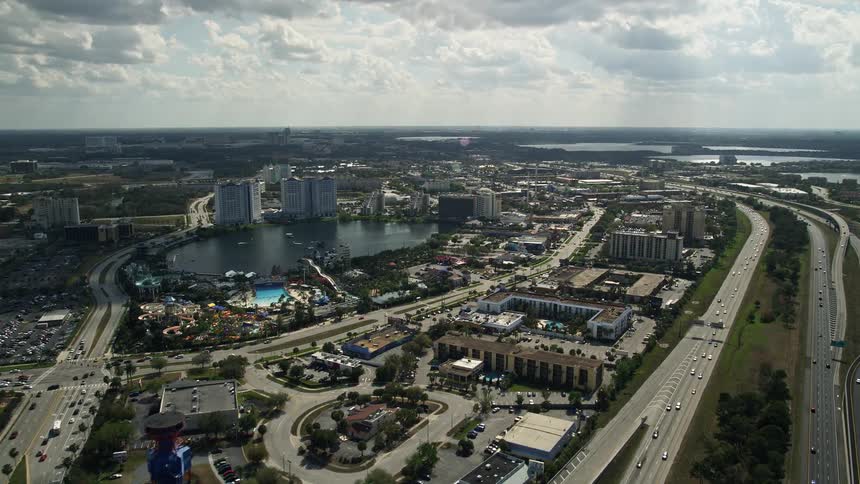 Enjoy the thrill of Wet n Wild water parks massive water slides as seen from an aerial view in Orlando Florida during a partly cloudy day