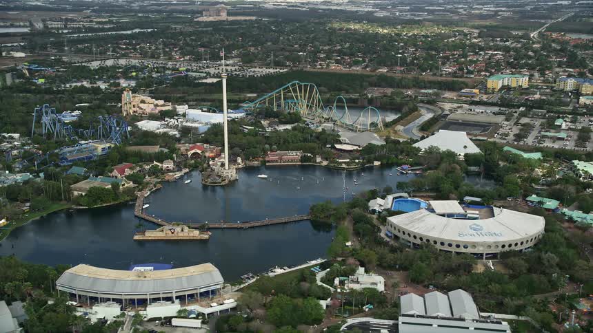 Aerial footage of Seaworld Orlandos aquatic theme park during a partly cloudy day