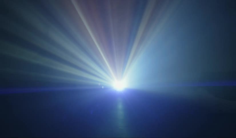 Rays protrude from a bright light