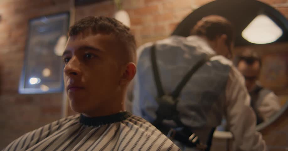 A customer waits for the barber