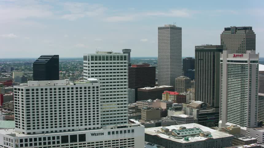 Aerial view of parking lot and skyscrapers near the river in the city