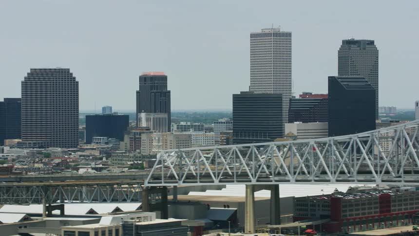 Bridges run over a river through downtown