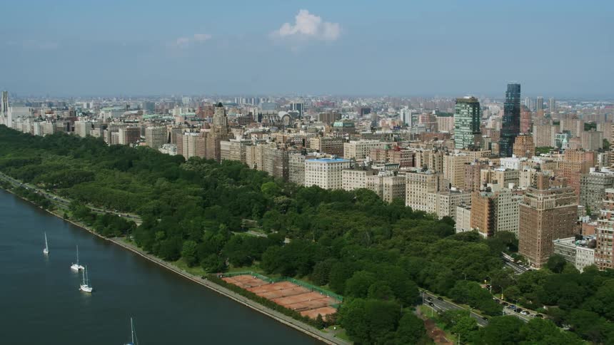 Aerial view of a large waterfront city at daytime