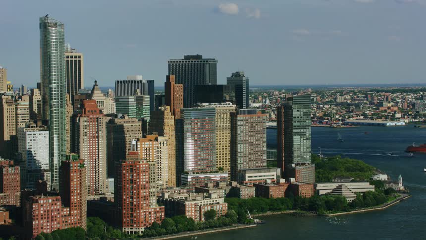 Aerial view orbiting lower manhattan battery park daytime