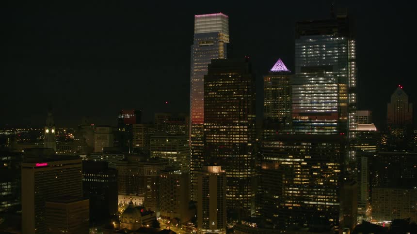 Aerial view of tall skyscrapers on the manhattan skyline at night