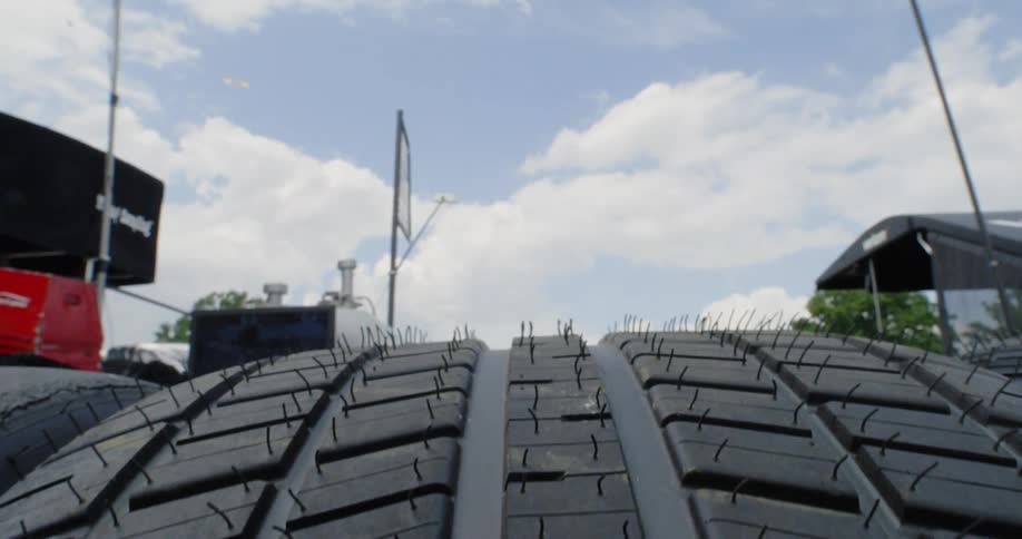 Spikes are raised on a large racing tire