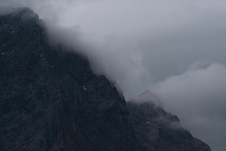 Steam rises from the mountain