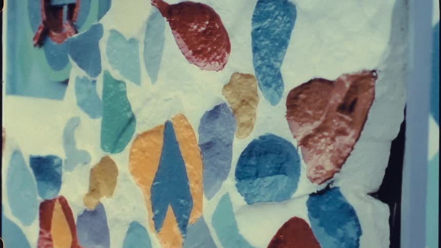 An art piece is made up of different shapes and colors