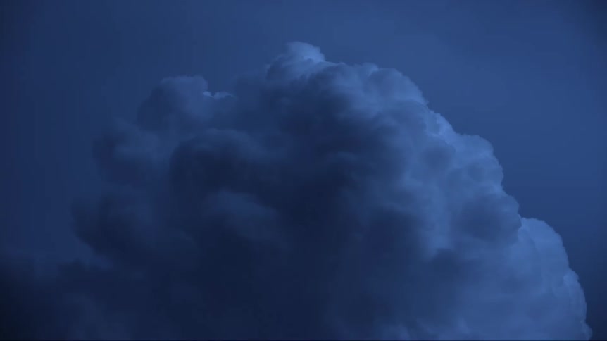 Lightning flashes in the dark storm clouds