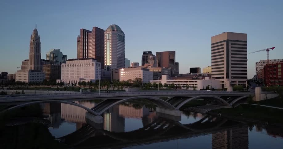 A medium sized city is being filmed by a drone