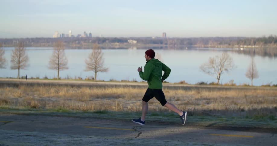 Man Jogging In Park