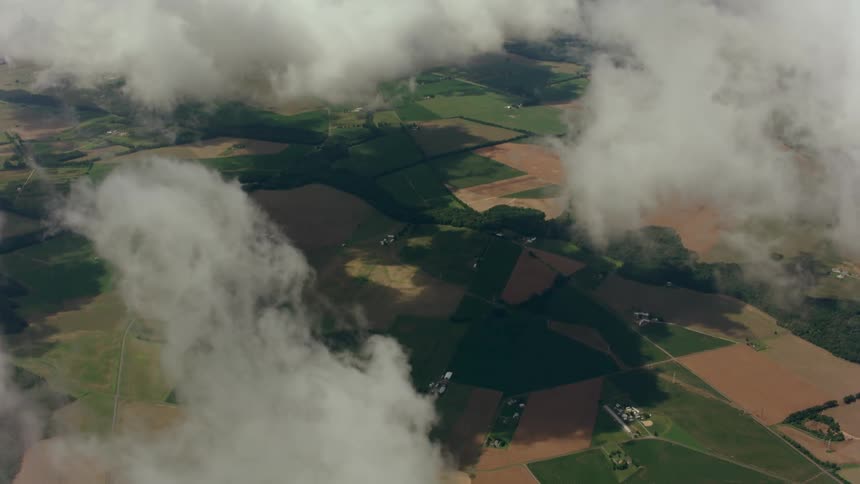 The clouds cast shadows on the horizon