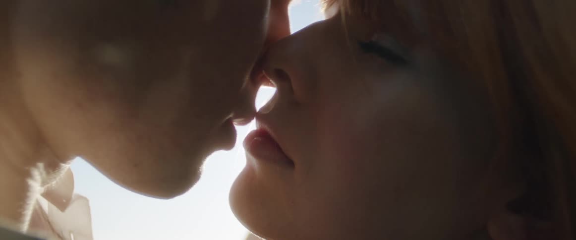 A man and woman kissing