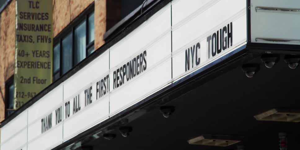 A sign at a movie theater thanking first responders